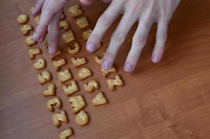 Hands on cracker keyboard buttons photo