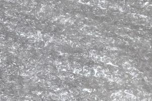 White bubble Wrap Packing Or Air Cushion material. Abstract Texture For Creative Art Work, Close Up dfckground, Top View with Copy Space photo