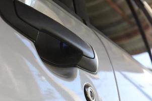 Close up black car door handle. Car equipment photo