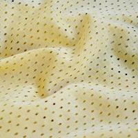 Yellow mesh sport wear fabric textile background pattern photo