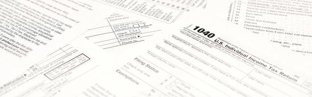 Blank income tax forms. American 1040 Individual Income Tax return form photo