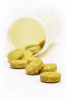 Yellow round pills