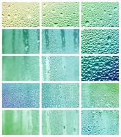 un collage de muchos fragmentos diferentes de vidrio, decorado con gotas de lluvia del condensado. tonos primaverales con colores verde y azul foto