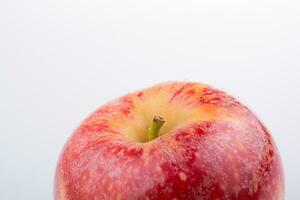 Fresh red apple with dots in close up view photo