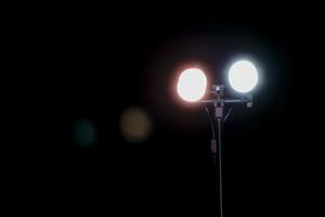 two light rays in the dark background, light stand photography photo