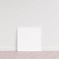 Empty picture frame on wooden floor leaning against wall. Blank poster frame standing on wooden floor. Blank poster frame mockup. Empty picture frame mockup. 3d rendering. photo