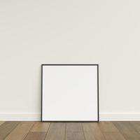 Empty picture frame on wooden floor leaning against wall. Blank poster frame standing on wooden floor. Blank poster frame mockup. Empty picture frame mockup. 3d rendering. photo