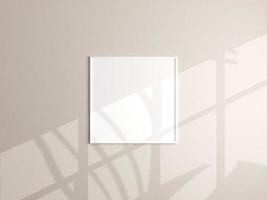 Photo frame mockup hanging on beige wall. Minimalist background. Blank picture frame mockup in living room. Poster mockup. Clean, modern, minimal frame. 3d rendering.