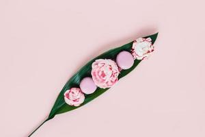 Greeting card with peonies, macaroons. The Central composition. photo