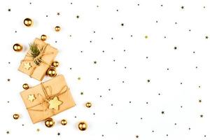 Christmas card. Background with two gifts, gold balls and stars. photo