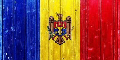 Flag and coat of arms of Moldova on a textured background. Concept collage. photo