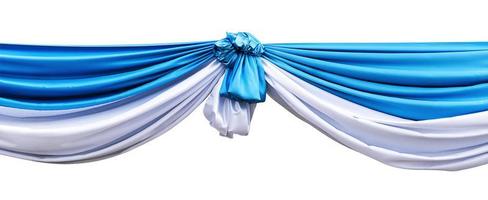 Blue and white drapery curtain for interior performance event on theatrical stage isolated on white background with clipping path photo