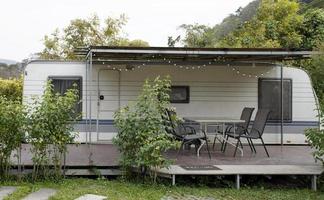 Caravan trailer with balcony in front photo