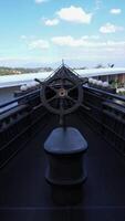 Photo of balcony looks like a boat in the top of building.