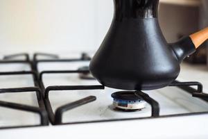 Turk on a gas stove, close-up photo