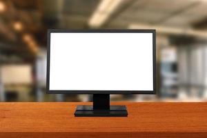 Blank screen desktop computer in office room with copy space photo