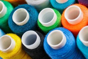 Colorful spools of sewing thread. Colored thread for sewing photo