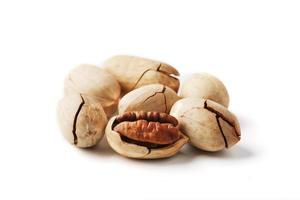 Pecan isolated on white background. Close-up, macro. A nut in a shell. photo