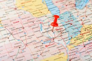 Red clerical needle on a map of USA, Illinois and the capital Springfield. Close up map of Illinois with red tack photo