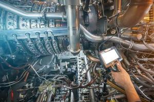 Inspection of a gas turbine engine using a Video Endoscope. Search for defects inside the turbine and shooting on video, photos using a measuring instrument.