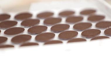 Mini Chocolate Slices In A Tray - close up, panning shot video