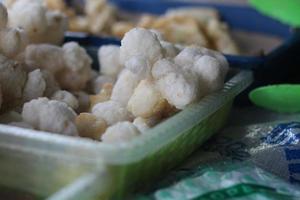 Geblek or cenolan is a traditional food from salaman, Magelang, made from tapioca flour and seasoned with savory fried onions. photo