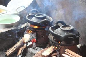 a furnace for making pancakes, made of clay and has a unique and small shape photo