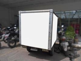 side of shipper box in truck car with blank billboard mockup, blank ad poster template, information banner placeholder mock up photo