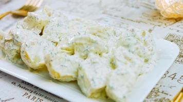 Such a tender potato salad with mastard, mayonnaise, red onion and dill. Wath the recipe in video