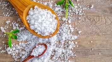 Natural salt from the sea on the dining table photo