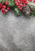 Fir Tree Decorations  On Black Concrete With Copy Space photo
