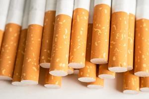 Cigarette, tobacco in roll paper with filter tube isolated on white background, No smoking concept. photo