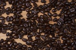 coffee beans wood background photo