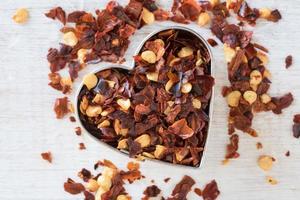 Red Pepper Flakes in a Heart Shape photo