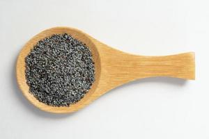 semillas de amapola en una cuchara foto