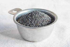 Poppy Seeds in a Measuring Cup photo