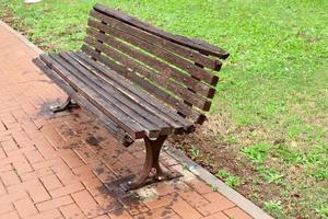 Bench for rest in a city park in Israel. photo