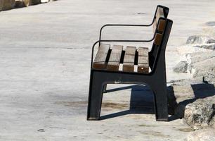 Bench for rest in a city park in Israel. photo