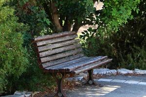 Bench for rest in a city park in Israel. photo