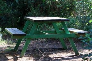 Bench for rest in a city park in Israel. photo