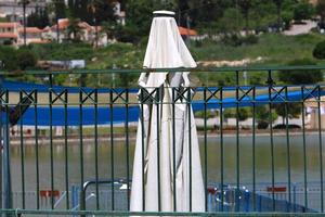 Umbrella in the city park near the sea. photo