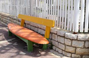 Bench for rest in a city park in Israel. photo