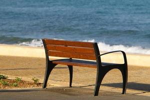 Bench for rest in a city park in Israel. photo