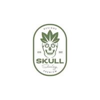 scare skull smile with leaf badge logo design vector