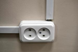 Electrical power outlet for electrical devices. Household electrical outlet. photo