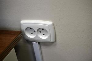 Electrical power outlet for electrical devices. Household electrical outlet. photo