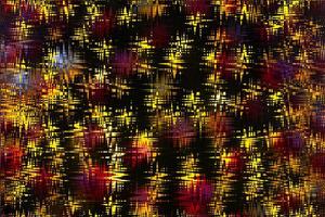 Yellow, red zigzags on black background. Abstract backdrop photo