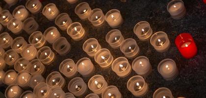 Votive candles lit photo