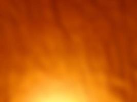 abstract orange blur background with black gradient pattern. photo