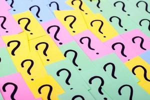 Question marks. Colorful paper notes with question marks. Concept image. Closeup. photo